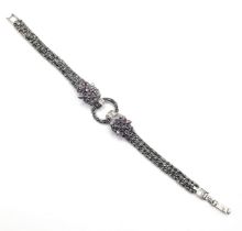 A silver and marcasite designer style bracelet. Approx 20cm.