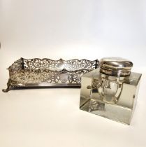 A rectangular silver ink stand, with reticulated decoration, hallmarked London, makers mark GSH (?),