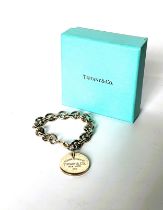 Tiffany silver bracelet with 'Return to Tiffany' silver charm, with pouch and box