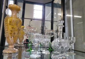 A pale yellow glass vase with twin handles 28.5cm, decanter and ten wine and sherry glasses. (12)