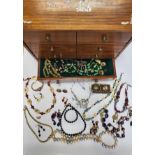 A collection of costume jewellery items, including various beaded necklaces, bracelets, etc.