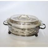 A silver plated glass butter dish.