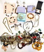 A group of costume jewellery items, including pieces by Lola Rose, a malachite bangle, beaded
