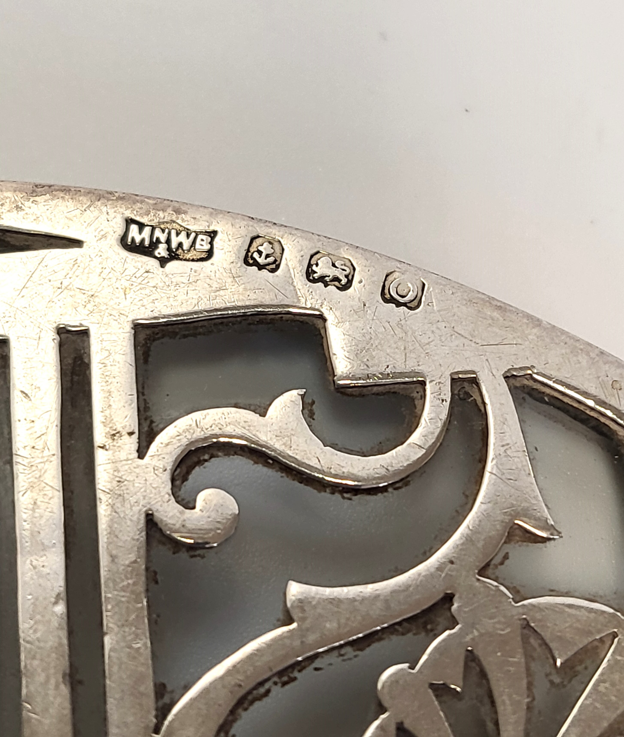 A silver mounted glass wine coaster, with geometric decoration, hallmarked Birmingham, makers mark - Image 2 of 4