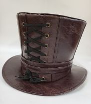 A Steampunk brown leather top hat, with laced detail, size M