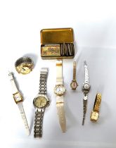 A group of seven watches and mapping pen nibs