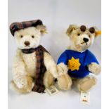 A Steiff white Summer Bear and white Winter USA Bear, both 35cm. (2)