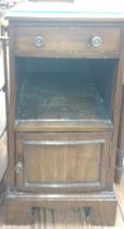 A wooden bedside cupboard. circa 1920 74cm x 41cm x 37cm