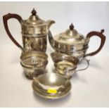 A silver tea pot, coffee pot, sugar bowl, and milk jug, with gadrooned detail, hallmarked Sheffield,