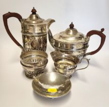 A silver tea pot, coffee pot, sugar bowl, and milk jug, with gadrooned detail, hallmarked Sheffield,