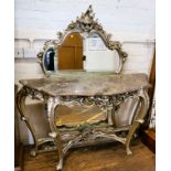 A large mirrored console table, in French Baroque style, with marble top and silver painted wooden