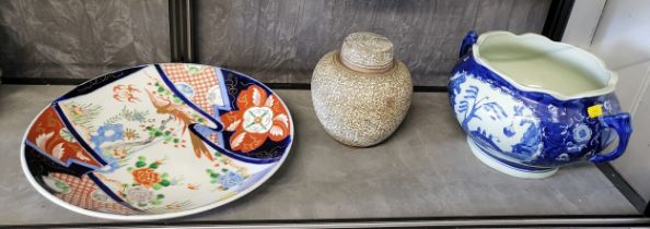 A Japanese Arita dish 36.5cm diameter, a blue and white two-handled bowl and an Indian brass