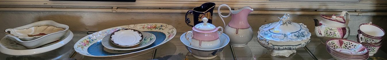 A Dawson pink lustre teapot with four cups and five saucers, A Myott's Rose and Ribbon pattern