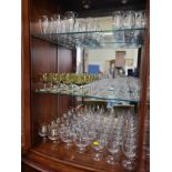 Twelve wine glasses with tinted cup-shaped bowls and sets and part sets of wine glasses and Brandy