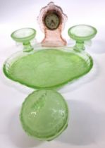 A green tinted pressed dressing table vanity set, tray 31cm wide and a pink tinted pressed glass