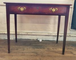 A late 19th / early 20th century mahogany side table with one drawer, brass handles, supported on