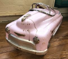 A children's toy Super Sport pedal car in pale pink, of retro design. 45cm x 96cm x 43cm.