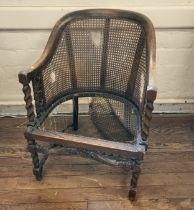 An oak and rattan chair with barley twist legs, in need of attention. Seat lacking.