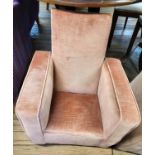 A pink upholstered child's armchair. 70cm (h)