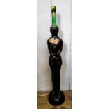 An unusual 1978 bottle of Chianti, the bottle shaped in the form of a medieval knight, (labels