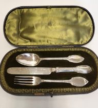 A silver knife, fork, and spoon set, with engraved decoration, hallmarked 1860s (indistinct), makers