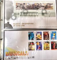 Two albums of First Day covers including: Book Five 2011 Classic Locomotives of England, Musicals,