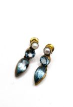 A pair of silver gilt, blue topaz and pearl drop earrings, the articulated mounts set with pear-