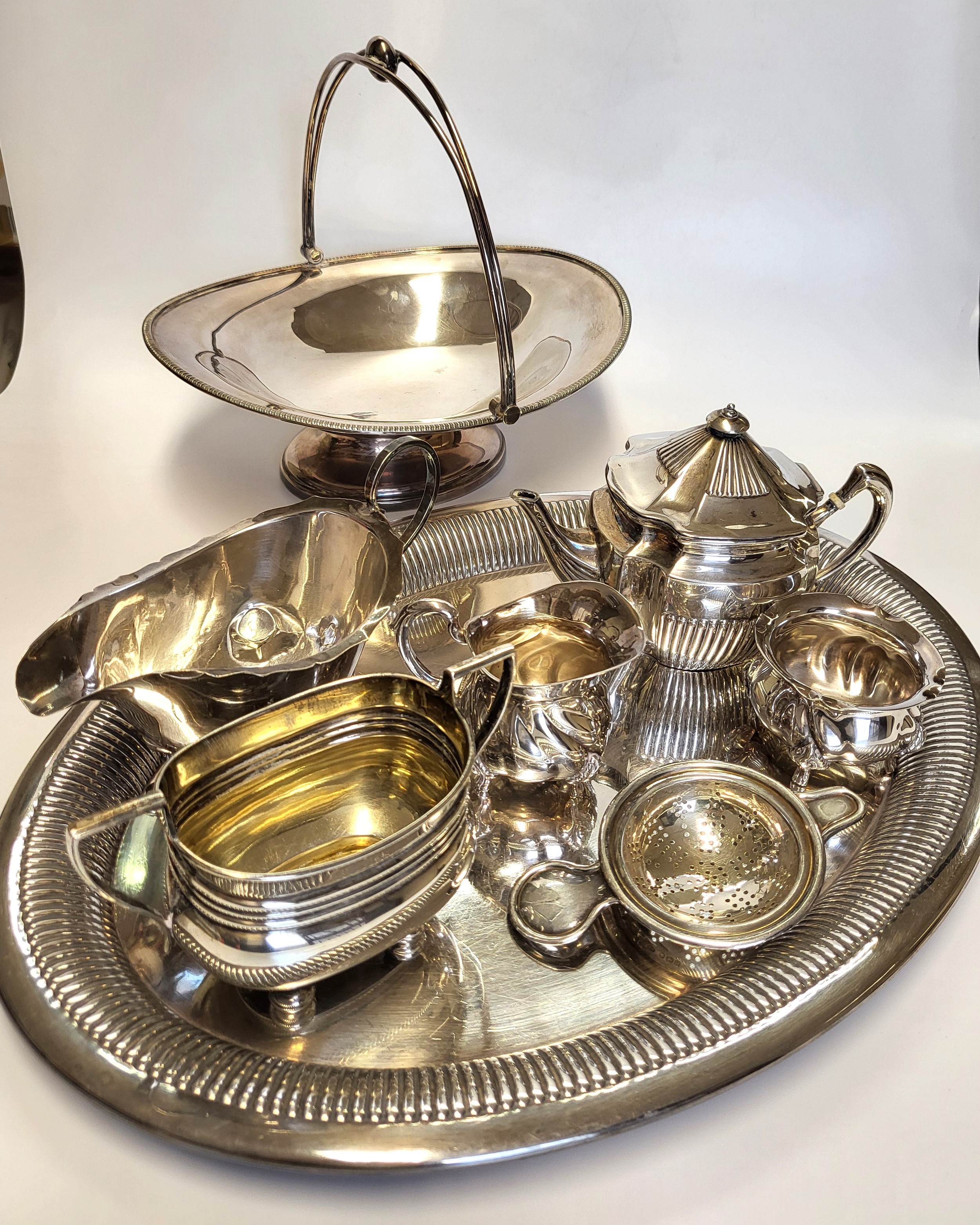 A silver sugar bowl, hallmarked Birmingham, makers mark WA, together with a small silver cream jug