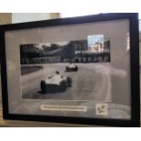Sir Stirling Moss framed A4 photo 1955 Aintree 1st grand Prix win with signature. 33cm x 43cm.