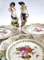 Seven European porcelain plates with pierced rims 24cm diameter (two pierced rims with slight