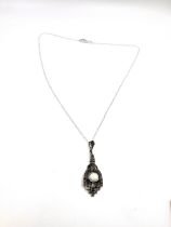 A silver marcasite and opalite drop pendant necklace. Pendant approx. 5cm