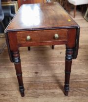 A Pembroke table with one authentic draw and one faux draw (brass know absent), with an aged patina.