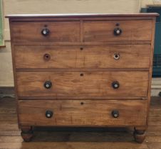A mahogany chest of drawers, two small drawers over 3 long, on bun feet. Two knobs are missing and