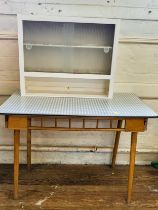 A 1960's table 75cm x 109cm x 69cm and a 1960's cabinet 64cm x 76cm x 30cm. (2)