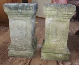 A matching pair of stone pillars. 61cm x 31cm x 31cm each.