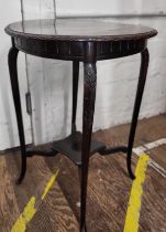 A mahogany Regency-style occasional table. Damage to surface.