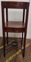 An Edwardian wash stand (lacks inserts). Part of inlay absent. 90cm x 36cm x 38cm.