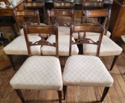 A set of eight Regency dining chairs