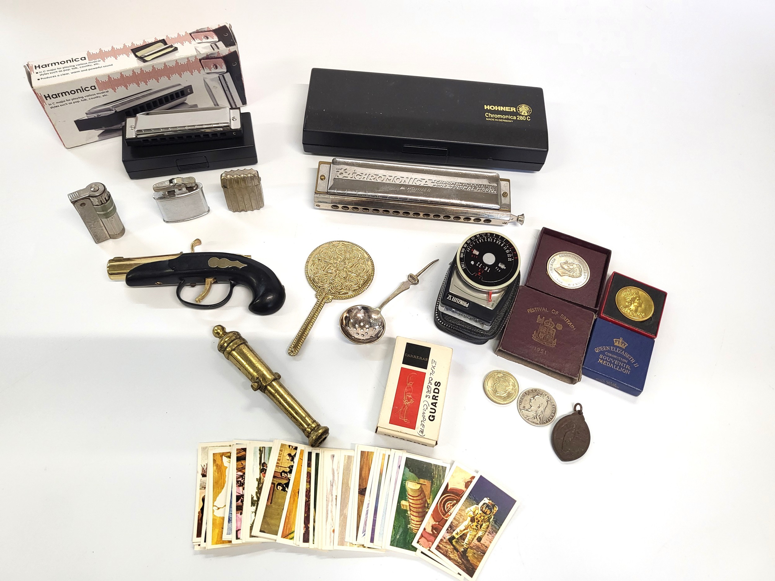 A Hohner Chromonica 280C and a Harmonica in C Major, both boxed. Also including a Queen Victoria