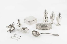 A collection of silver, comprising a late Victorian navette shaped trinket box, repoussé decorated