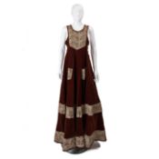 A classic Anna Belinda of Oxford autumn/winter dress in brown velvet featuring an autumnal swirly,