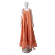 A vintage classic Laura Ashley floral maxi dress 1977 of pale orange and white floral design, and