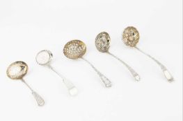 A George III silver sifter spoon, with foliate embossed and engraved pierced bowl, and foliate