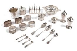 A collection of silver, comprising a five bar toast rack, Birmingham 1937, a pierced circular