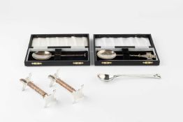 A Jersey silver millennium spoon, with Celtic cross and spinning globe terminal, by A. P. Gilson for