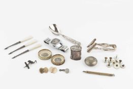 A collection of small silver items, to include a French asparagus tongs, a 19th century caddy