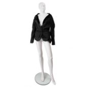 An Yves Saint Laurent, black blazar jacket in a gothic style, almost off the shoulder look with
