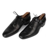 A pair of men’s Louis Vuitton black leather lace ups Made in Italy Size 9 ½ M With original care