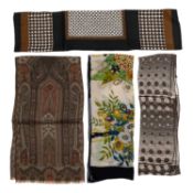 An Yves Saint Laurent silk scarf in shades of bronze, black and white, (80cm x 80cm); A Nina Ricci