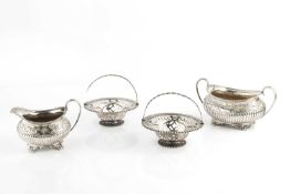 A late Victorian silver twin handled sucrier, and matching milk jug, with lobed and foliate embossed